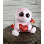 Pink plush monkey holding a red heart