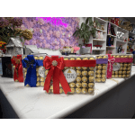 Boxes of Ferrero Rocher chocolates tied with colorful ribbons