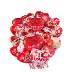 Cluster of heart-shaped red and white balloons with love messages