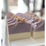 Lavender and cream layered soap bars with dried petals on top