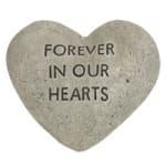 Heart-shaped stone engraved with "FOREVER IN OUR HEARTS"