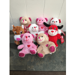 Assorted plush teddy bears in pink, white, beige, red, and brown