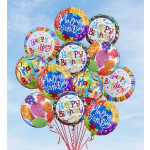 Cluster of colorful birthday balloons against a blue sky