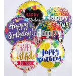 Cluster of colorful birthday balloons with printed messages