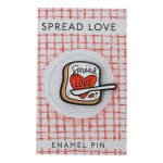Enamel pin on a card with a toast and heart design