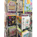 Display rack of colorful birthday greeting cards