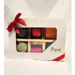 Box of assorted chocolates with red ribbon