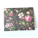 Floral pattern on a dark background with pink and white blossoms