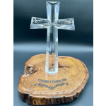 Clear glass cross on a wood slice base