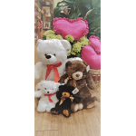 Teddy bears with pink heart pillows and green hydrangeas