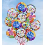 Cluster of colorful Happy Birthday balloons against a blue sky