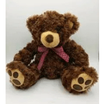 Brown teddy bear with a pink ribbon sitting on a white background