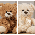 Two plush teddy bears with satin bows, one brown and one cream
