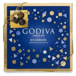 Box of assorted Godiva chocolates tied with a gold ribbon