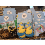 Assorted novelty socks with animal and rainbow designs on a shelf