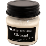 Jar candle with black lid and gingerbread label