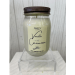 Jar candle labeled vanilla and cinnamon