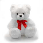 White teddy bear with a red ribbon bow