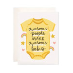 Greeting card with a yellow baby onesie and rainbow accents