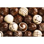 Assorted chocolate truffles with drizzled and sprinkled toppings
