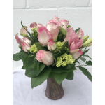 Pink roses and green hydrangeas in a vase