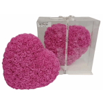 Pink heart-shaped ornament covered in small rose rosettes, with a matching piece in a clear gift box