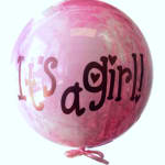 Pink balloon with the words "It's a girl!"