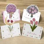 Four floral greeting cards with pink and purple bouquet designs