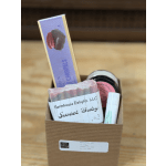 Gift box with soap, lip balm, and a caramel bar