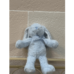 Light blue plush bunny with a ribbon bow