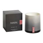 Boxed scented candle beside a gray glass candle jar