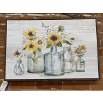 Framed floral painting with sunflowers in glass bottles