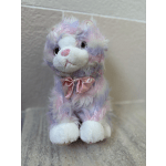 Pastel plush cat with a pink satin bow