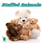 Assorted teddy bears grouped together on a white background