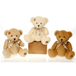 Three teddy bears with ribbon bows on a white background