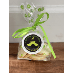 Bag of key lime cookies tied with a green ribbon