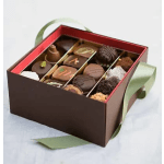 Box of assorted chocolates with green ribbon handles