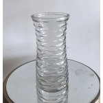 Clear glass vase with a wavy textured surface