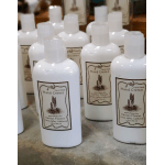 Travel-size hand creme bottles with cactus flower labels