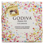 Godiva chocolate gift box with colorful confetti pattern and gold ribbon