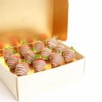 Box of chocolate-covered strawberries in a gold gift box