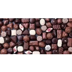 Assorted chocolates in a box with dark and white pieces