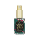 Bottle of Rouge & Rye perfume oil with a gold spray top