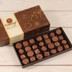 Box of assorted milk chocolates in a decorative gift box