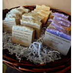 Basket of assorted wrapped soap bars in lavender and cream
