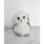 Plush owl toy with white fur and gray feet