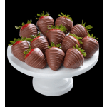 Chocolate-covered strawberries on a white pedestal stand