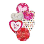 Cluster of heart-shaped balloons with love messages in pink, red, and white