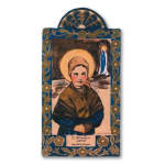 Decorative St. Bernadette wall plaque with painted halo and floral border in blue and gold tones