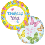 Two butterfly-themed balloons with "Thinking of You" text